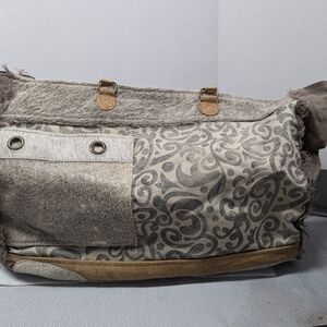 Myra Hide and Swirl print weekender bag.